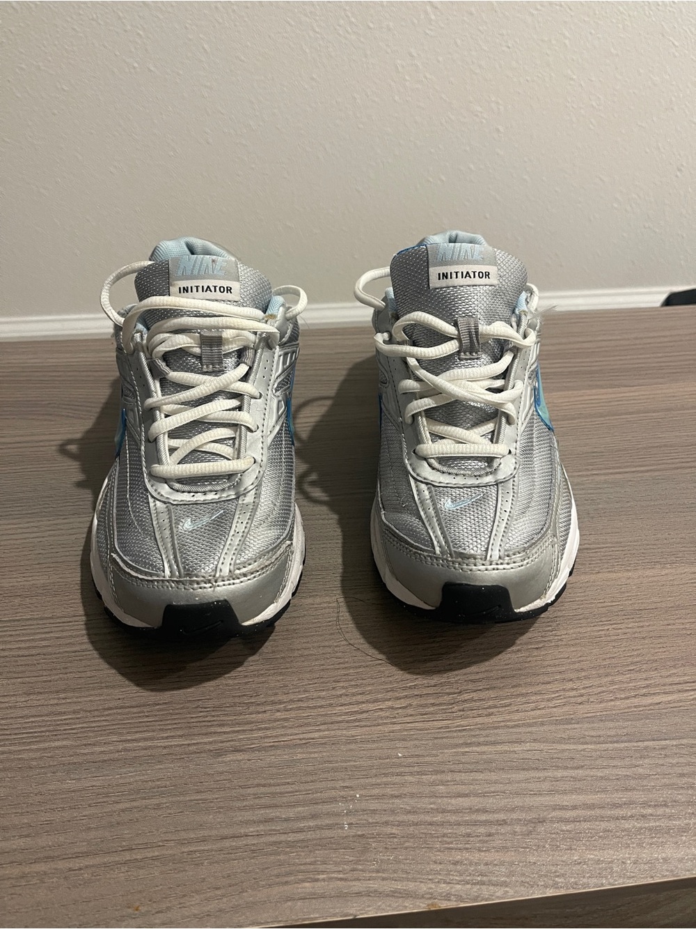 Nike Kids Silver Sneakers with Light Blue Swoosh